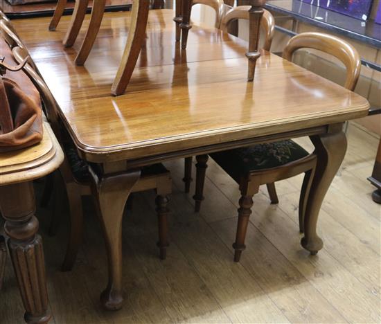 A 1920s mahogany extending dining table W.180cm extended
